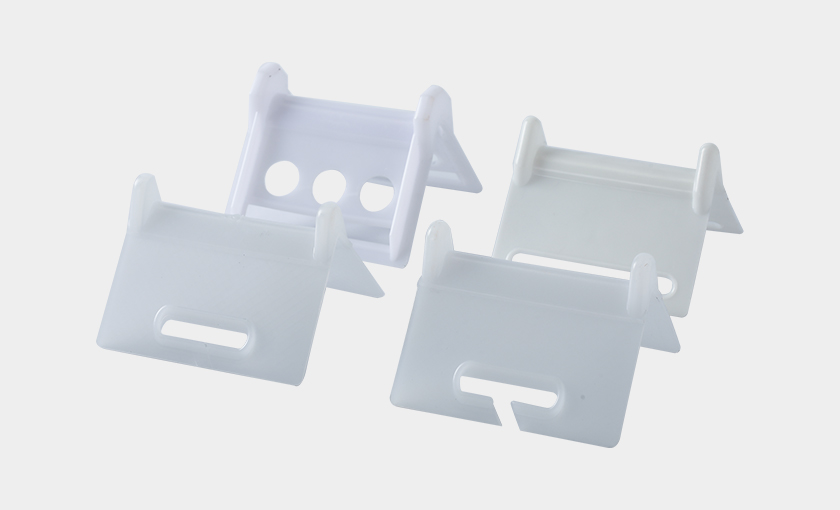Corner protectors for webbing strap